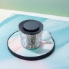 A single-person purple clay teapot with electric heating for boiling and steeping, used for daily household purposes Application Scenario